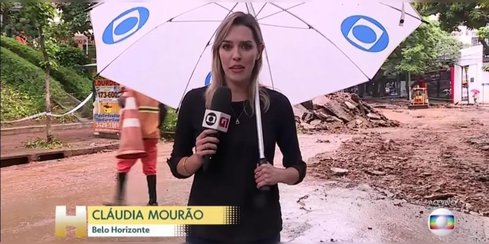 Imagem ilustrativa da imagem Repórter aparece segurando guarda-chuva no ‘Jornal Hoje’