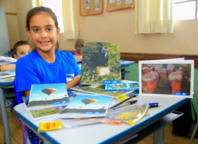 Cachoeira da Mariquinha, Vila Velha e revoada de balões estampam as capas dos cadernos escolares entregues para os alunos do Município.