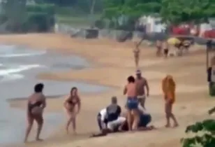 Em um vídeo publicado nas redes sociais, é possível ver banhistas tentando reanimar a menina