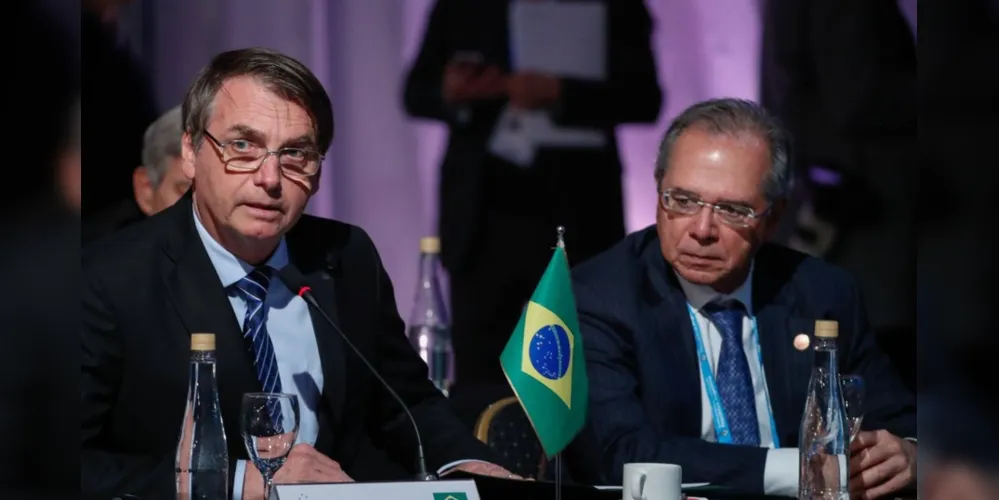 Presidente Bolsonaro (sem partido) e o ministro da Economia Paulo Guedes.