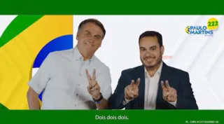 Bolsonaro e Paulo Martins juntos em material de campanha.