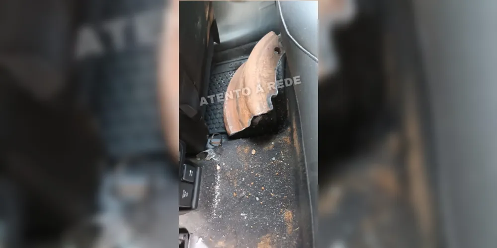 A peça teria atravessado o para-brisa e acertado a condutora