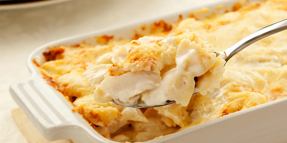 Imagem ilustrativa da imagem Receita Páscoa: Gravatinha ao Molho Cremoso de Bacalhau