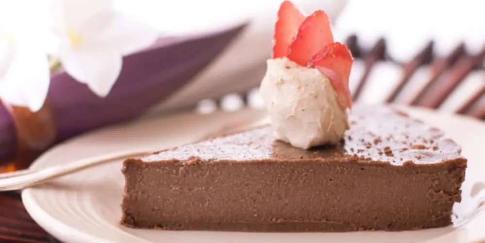 Imagem ilustrativa da imagem Torta de chocolate cremosa bem fácil de fazer. Veja a receita