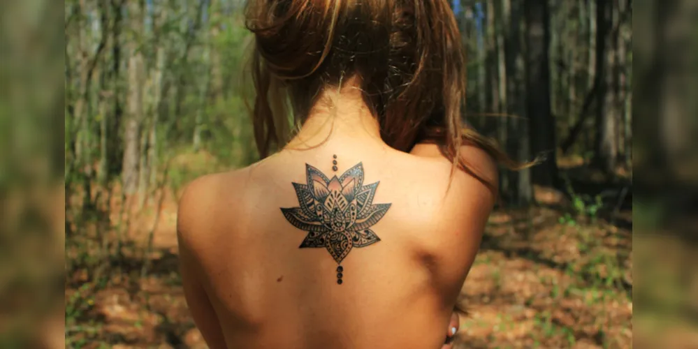 Imagem ilustrativa da imagem Descubra o significado da tatuagem de flor de lótus