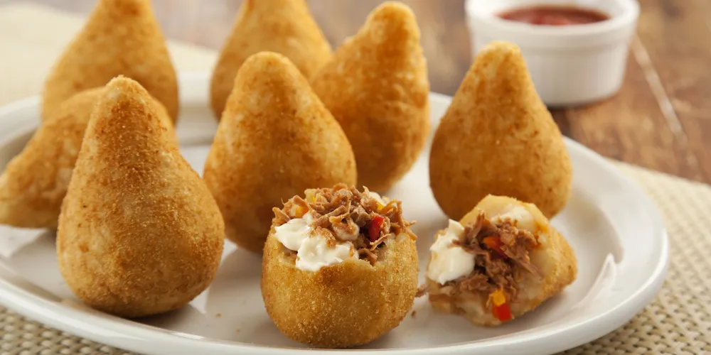 Imagem ilustrativa da imagem Confira a receita de coxinha de carne louca!
