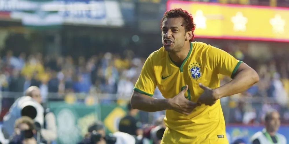 Imagem ilustrativa da imagem Brasil vence a Sérvia com gol de Fred antes de estrear na Copa