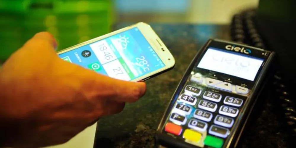 Imagem ilustrativa da imagem Pagamento de compras com smartphones chega ao Brasil