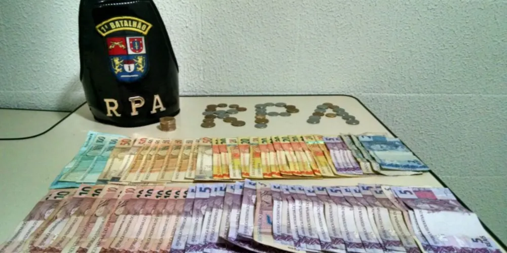 Imagem ilustrativa da imagem PM prende ladrão e recupera dinheiro roubado de posto