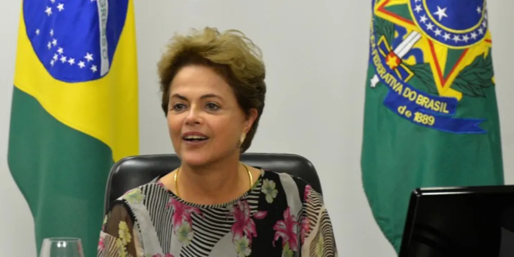 Imagem ilustrativa da imagem Dilma sanciona desoneração da folha de pagamento